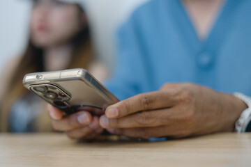 Social media marketing concept hand using smartphone searching data networks or chatting online. typing sending message.