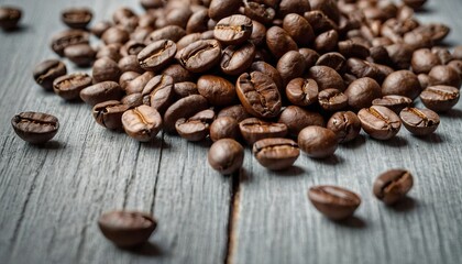 Side view of fresh coffee beans isolated on a white wooden background
1