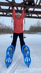 Young woman snowshoeing