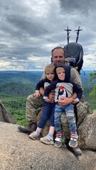 Father with children in the mountains