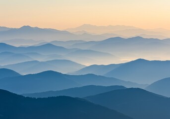 Obraz premium Layered Mountain Range at Dusk Hues of Blue and Gold