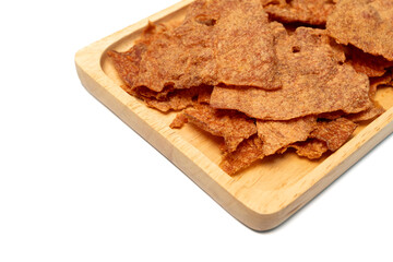 Sweet crispy pork slices, dried on a wooden tray