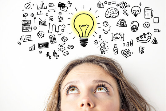 Woman's face looking up at bright yellow light bulb surrounded by various hand-drawn business icons on white background, concept of creative thinking. Ai generative - Powered by Adobe