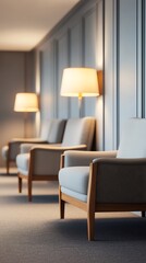 A serene interior featuring stylish armchairs and soft lighting, creating a cozy and inviting atmosphere.