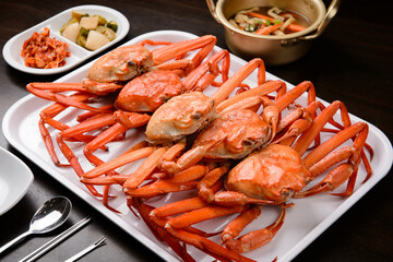 Sea crabs on a white plate
