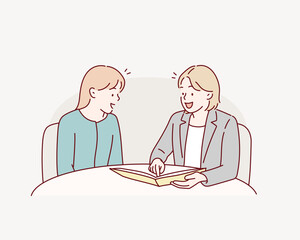 Lawyer having meeting with woman. The woman is explained to the woman in the suit. Hand drawn style vector design illustrations.