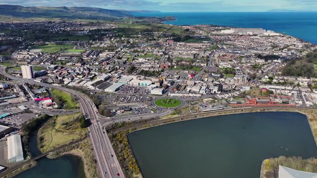 Aerial video of Residential homes in Larne Town Co Antrim Northern Ireland
