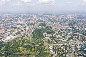 scenic aerial cityscape panorama during a sunny summer day. drone photography.