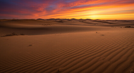 Stunning Sunset over Rolling Sand Dunes in Desert Landscape