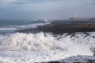 Lighthouse of Rabat and roaring wave of Atlantic Ocean, Morocco