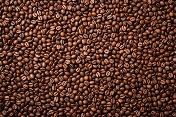 Glossy roasted coffee beans densely packed as background, realistic photographic style, overhead view, concept of caffeine, food, texture. Ai generative