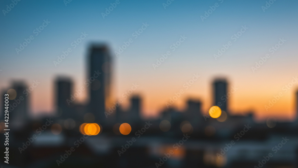 Poster the background consists of a blurred assembly of city buildings, creating a defocused visual effect