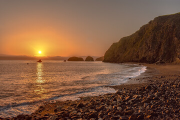 Sunrise at the beach, Scorpion Anchorage, Santa Cruz Island, Channel Islands National Park,...