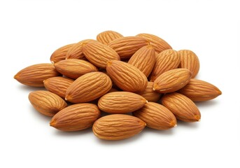 Fototapeta premium A pile of almonds on a white background showing the texture and shape of the nuts in a close up view