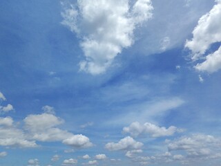 Fototapeta premium Bright blue sky with pure white clouds. The sky was very clear and clouds were everywhere