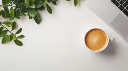 A front-facing shot of a young woman enjoying a cup of coffee while sitting at a white desk with a laptop, ideal for productivity and daily routine content