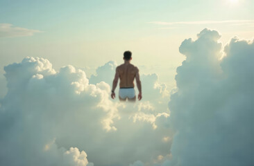 Obraz premium A man in white boxers flies in the sky with clouds