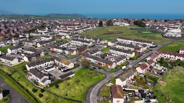 Aerial video of Residential homes in Larne Town Co Antrim Northern Ireland