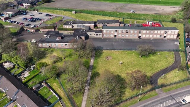 Aerial video of St Anthony's Primary School Larne Co Antrim Northern Ireland 