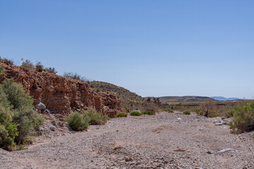 Gravelly basin fill alluvium, Calico Basin, Red Rock Canyon, Las Vegas, Clark County, Nevada. Mojave Desert.   dry stream bed / Intermittent, temporary or seasonal rivers. Fluvial terrace. gravel