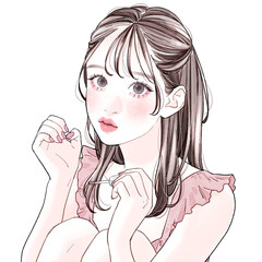 マニキュアを塗っている女性