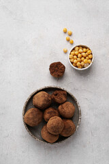 Top view of the plate with chickpeas truffles and bowl with chickpeas. copy space