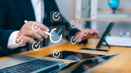 Audit business concept, Businessman checklist and filling survey form online, Examination for...