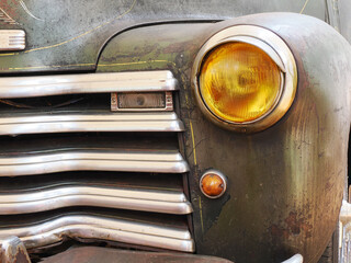 Old truck grill and headlights rusty