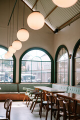 Cozy cafe interior with vintage design and warm lighting atmosphere