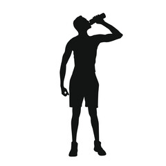 Silhouette of a man drinking water from a bottle