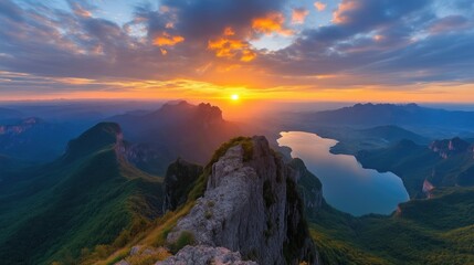 Majestic sunrise over mountain range and lake. Sunrise over alpine landscape