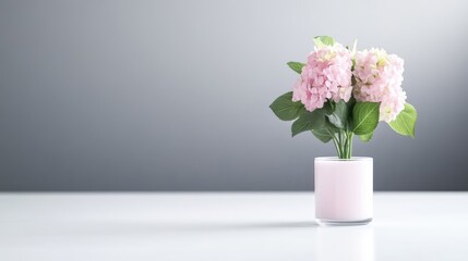 Naklejka premium Pink flowers in a pale pink vase