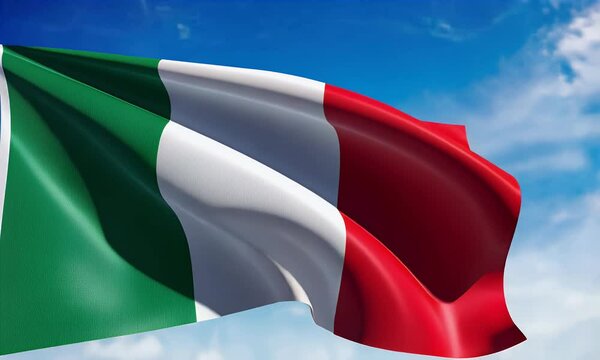 Italian flag waving in the wind against a blue sky with clouds.