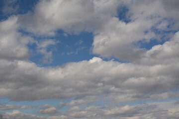Beautiful sky with different shades of blue, covered with clouds