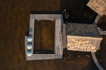 Aerial View of Wooden Dock with Swimming Pool