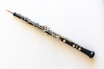 Oboe on white background, top view