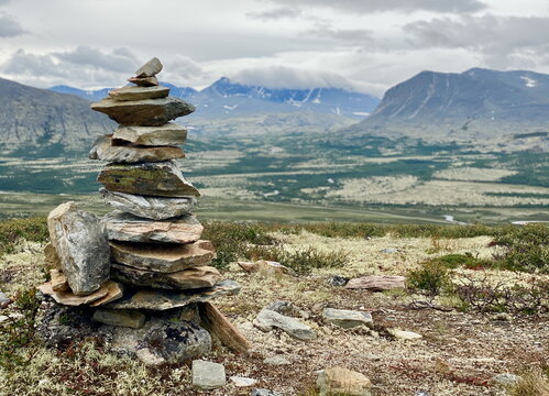 Rock cairn in Norwegian mountain landscape - Powered by Adobe