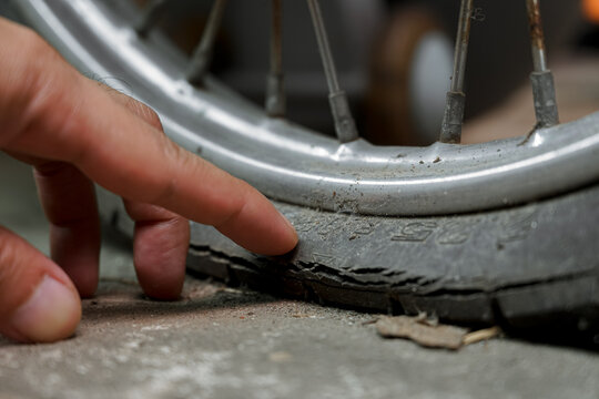 closeup Dirty wheel motorcycle flat tire 
