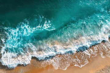 Aerial View of Ocean Wave Hitting Beach