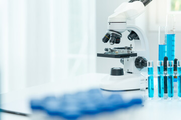 Scientist analyze biochemical samples in advanced scientific laboratory. Medical professional use...