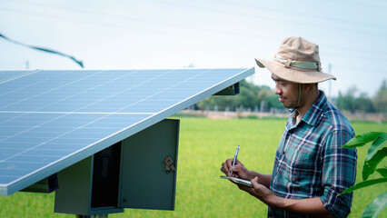 New technologies in agricultural business concepts. Farmers touch solar panels with renewable...