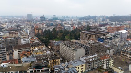 Fototapeta premium Geneva, Switzerland View of City Park Surrounded by Urban Buildings