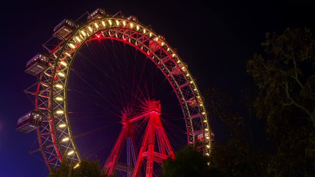 The famous Prater wheel in Prater, an amusement park in central Vienna. Time lapse clip at night