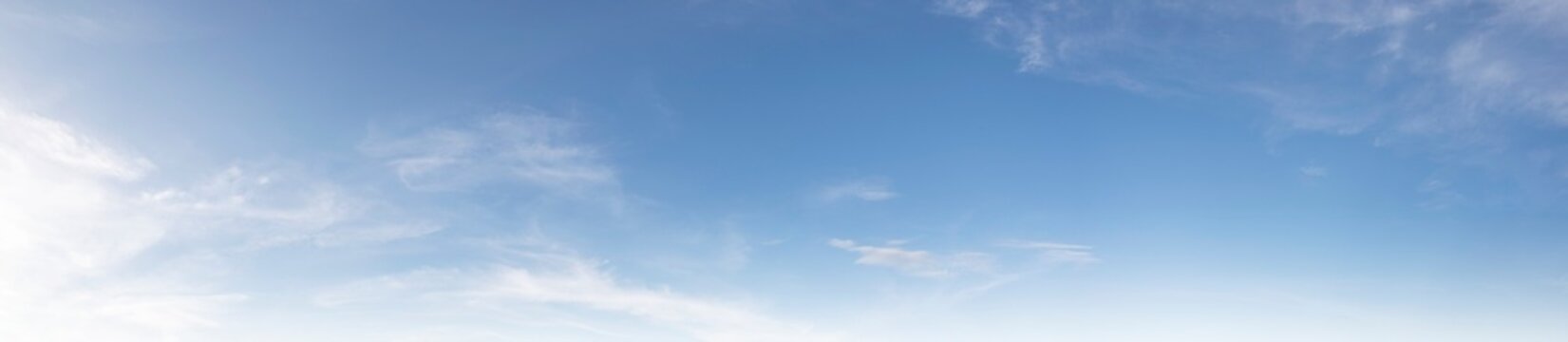 Sky vivid cyan white cirrus clouds soft gradient beauty spring bright blue sky fluffy clouds calm background sunshine light landscape gloomy weather gradient fade clear view horizon nature light wide.