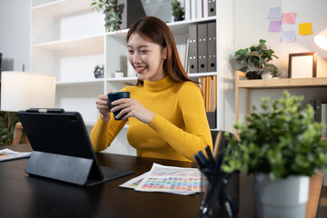 Designer woman thinking ideas strategy about mobile app interface wireframe design with customer...
