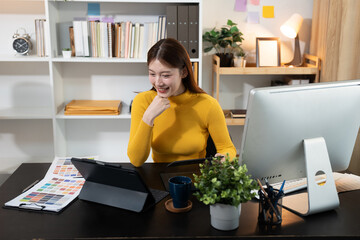 Designer woman thinking ideas strategy about mobile app interface wireframe design with customer breif and color code, User experience concept.