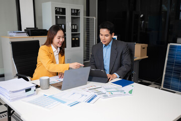 Business corporate team brainstorming, planning strategy having a discussion Analysis investment researching with chart at office desk documents in office.