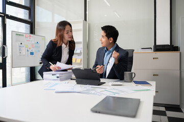 Business documents, data analysis, and teamwork in modern office.