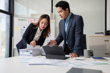 Business documents, data analysis, and teamwork in modern office.