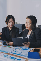 Accounting company provide finance and taxation planning for profitable cash flow, Auditor and accountant team working in office, analyze financial data and accounting record with calculator.Insight